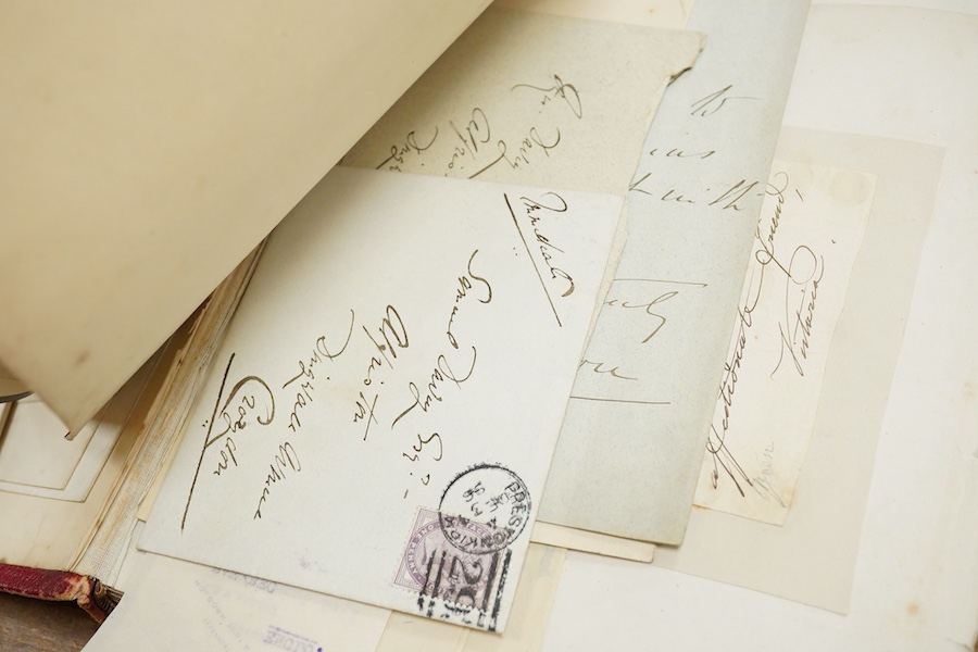 A Victorian autograph book containing a collection of complete letters, partial letters and cut out signatures from leading and influential figures primarily from the second half of the nineteenth century, many of the ex